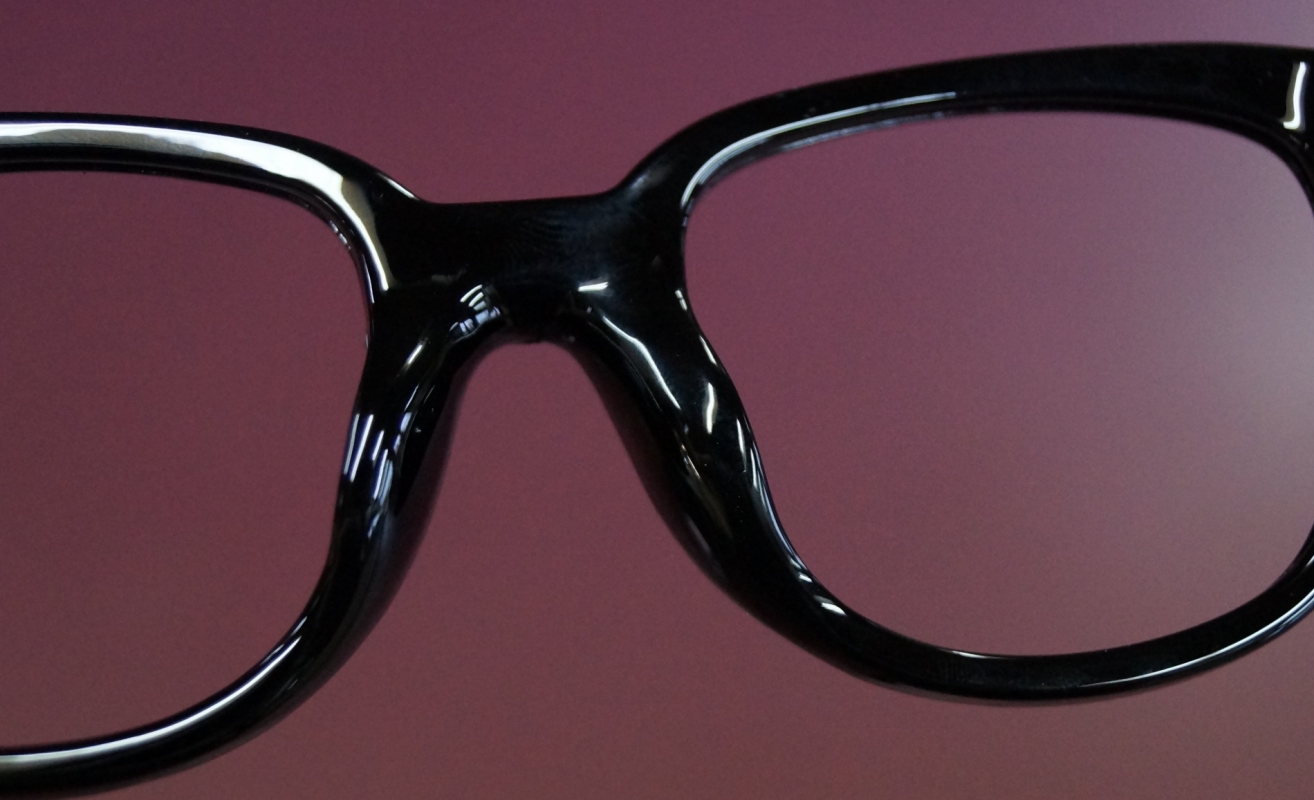 This plastic frame has had the nose pads build up to make the bridge fit a smaller nose, then re-sprayed for a perfect finish